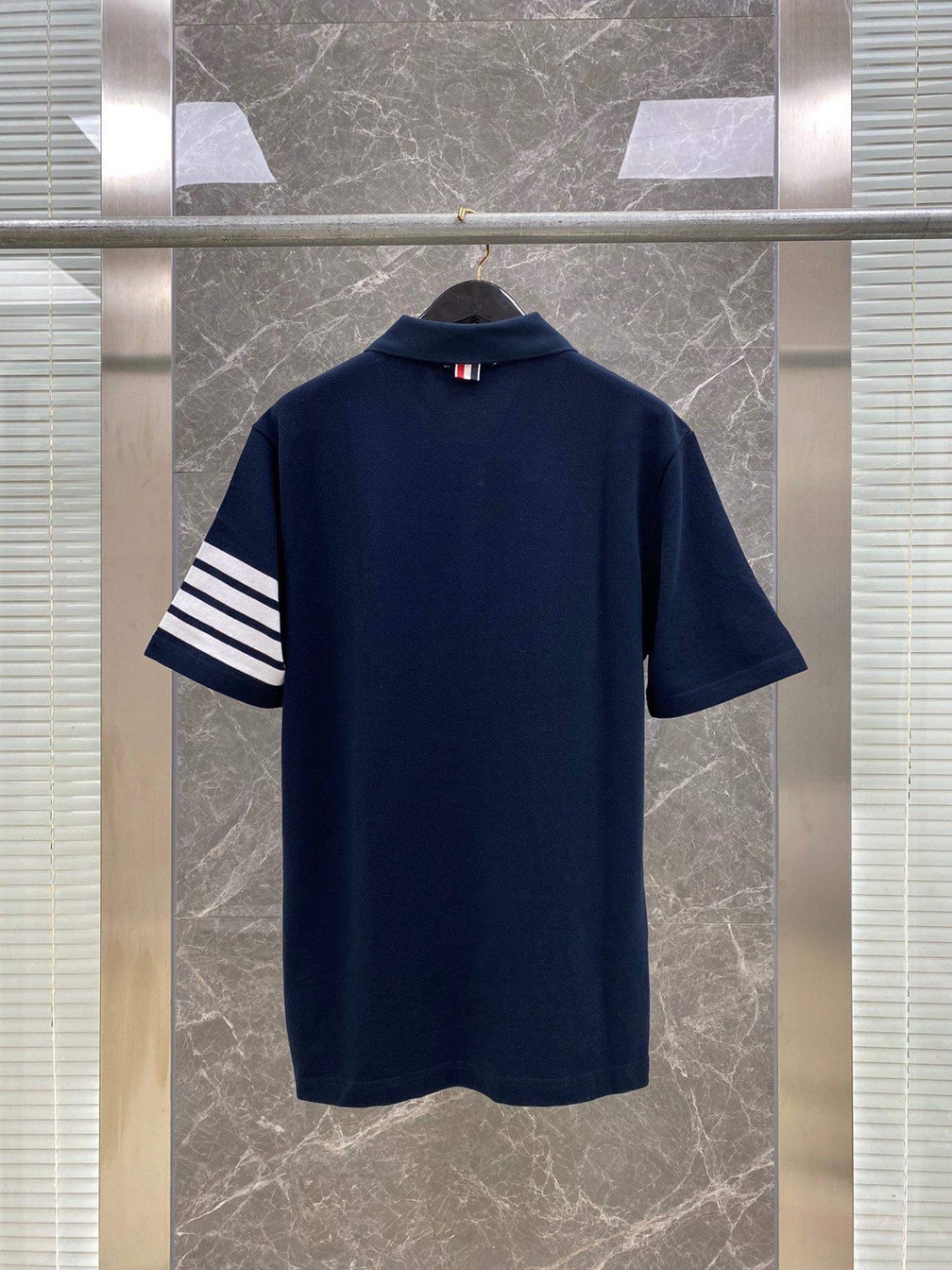 Polo Thom 3 Soc Tay Phai Tag Truoc