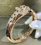 Cartier 18k Yellow Gold Diamondemerald And Onyx Panthere De Cartier Bracelet