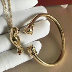 Cartier Panthere De Cartier Tsavorite Onyx 18k Yellow Gold Two Head Panthere Open Bracelet