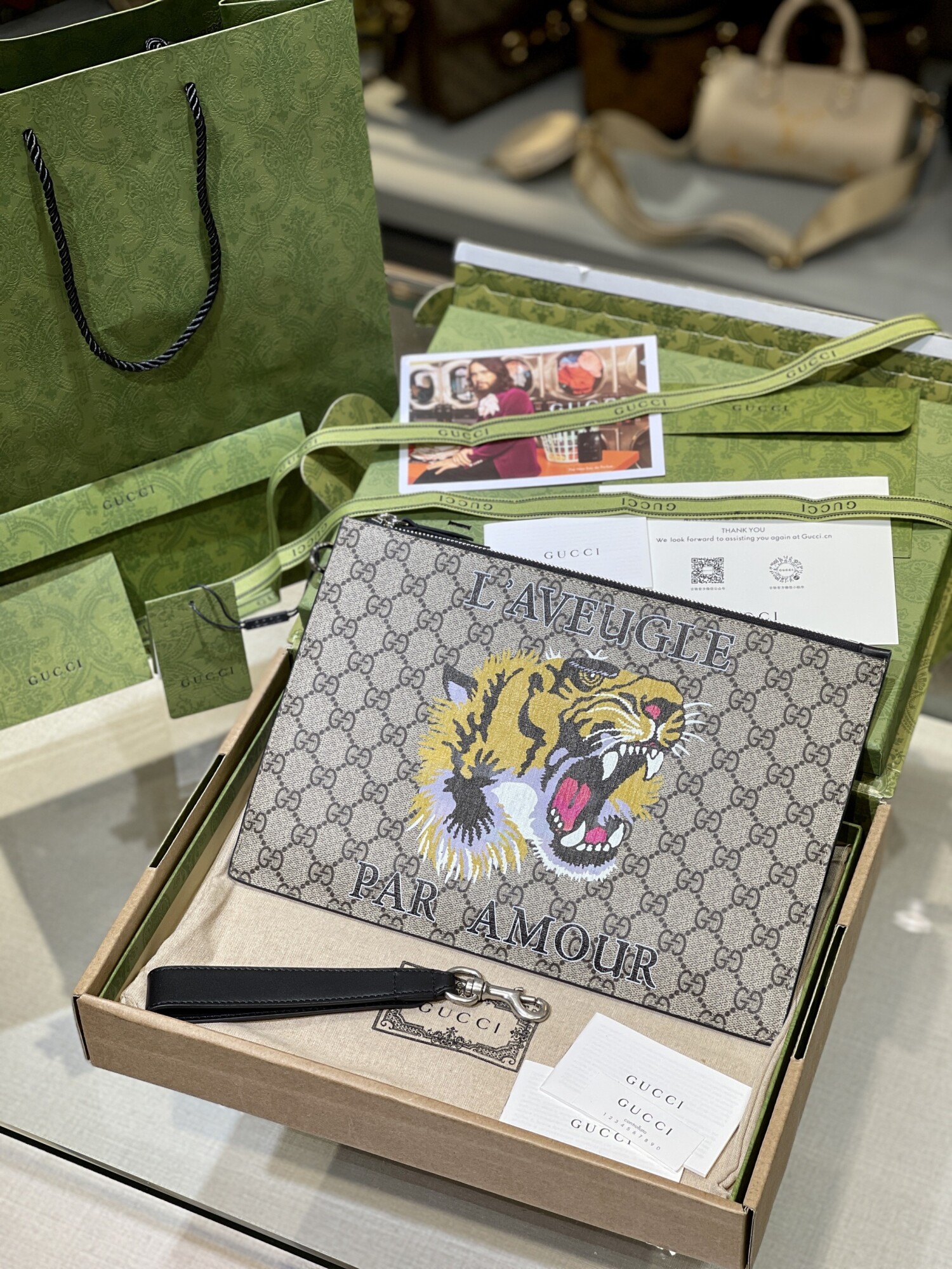 Gucci Clutch Tab Tiger Brown